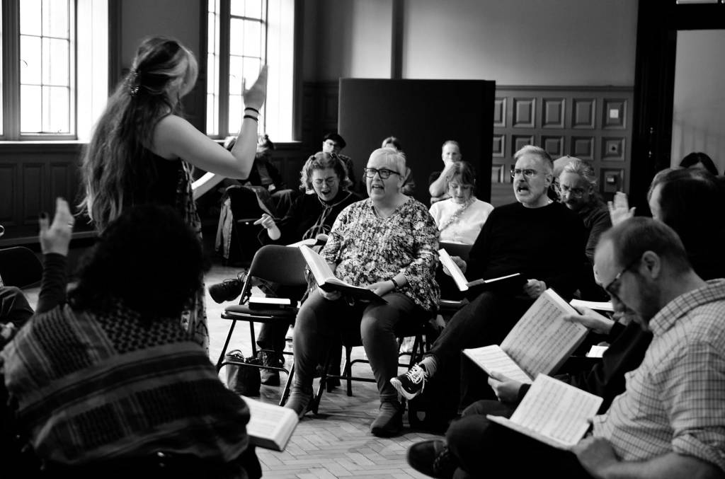 Lucy leading a song at Whitworth Art Gallery