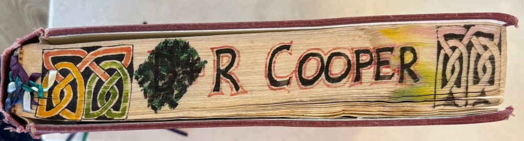 Decorated fore-edge of Sacred Harp book, with Celtic knots around the name R Cooper - the work of Bernard Collard, who died in 2025.