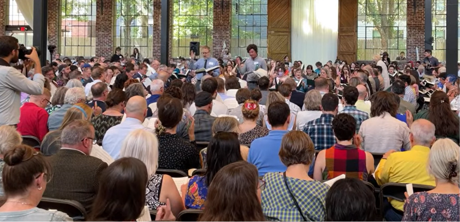 The launch of the 2025 edition of the Sacred Harp in Atlanta: Matt Hinton and Mark Godfrey lead their new song, 531 Clayton, in a packed hall